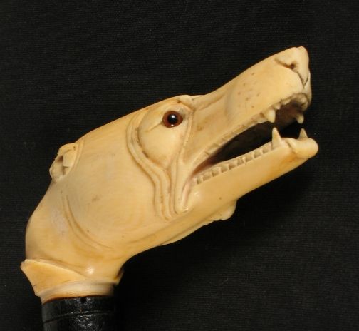 IVORY HANDLED CANE.