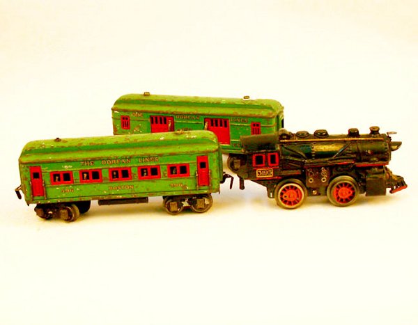 2 TOY TRAIN CARS. N/R. (1) ENGINE made: 2 TOY TRAIN CARS. N/R. (1) ENGINE made by american Flyer Co. Chicago, Ill. Size: 7 1/2"L condition: broken parts, paint worn. (2) Dorfan Line "american Railway Express" car #492. green with red doors.