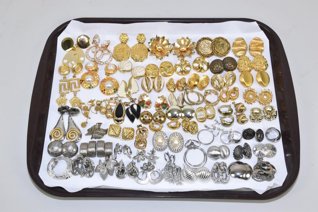 50 ASSORTED PAIRS OF CLIP AND SCREWBACK EARRINGS: 50 ASSORTED PAIRS OF CLIP AND SCREWBACK EARRINGS IN GOLD AND SILVER TONES. Vintage to modern assorted styles and sizes. Some designer signed: Trifari, Joan Rivers and more.