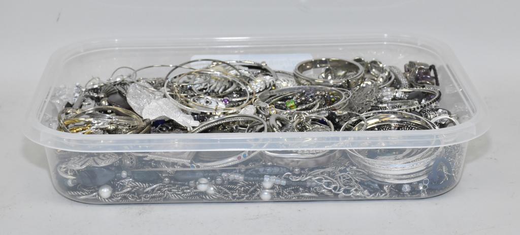 SMALL BIN OF MISCELLANEOUS SILVERTONE COSTUME: SMALL BIN OF MISCELLANEOUS SILVERTONE COSTUME JEWELRY. Weight: 8 lbs. 5 oz.
