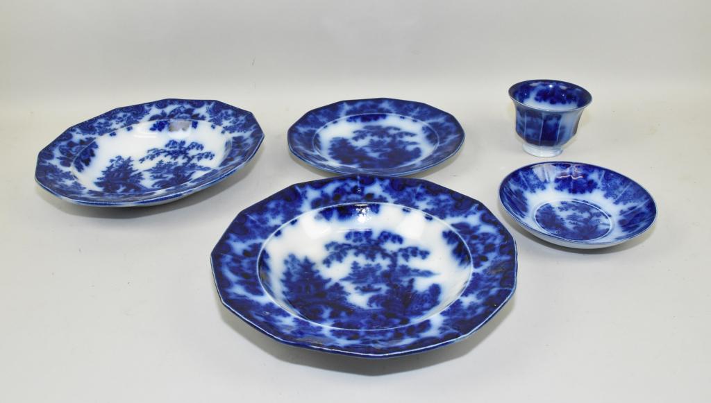 FLOW BLUE “Shanghe” PATTERN – 10.5” plate, 8.5”: FLOW BLUE “Shanghe” PATTERN – 10.5” plate, 8.5” plate and handleless cup and saucer. Five pieces.