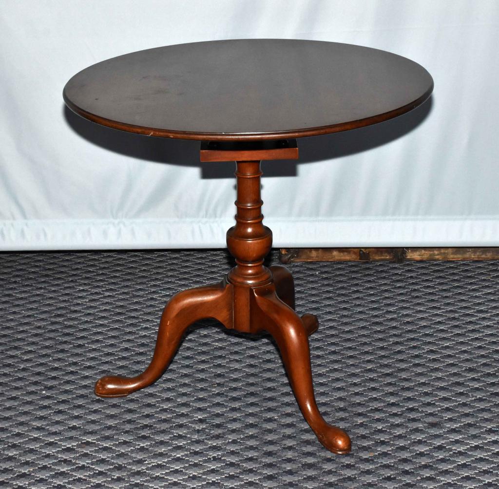 BIRDCAGE MAHOGANY TEA TABLE, circa 1940. Tilt and: BIRDCAGE MAHOGANY TEA TABLE, circa 1940. Tilt and turn tripod base, ring turned pedestal. 28.5'' x 30'' diameter.