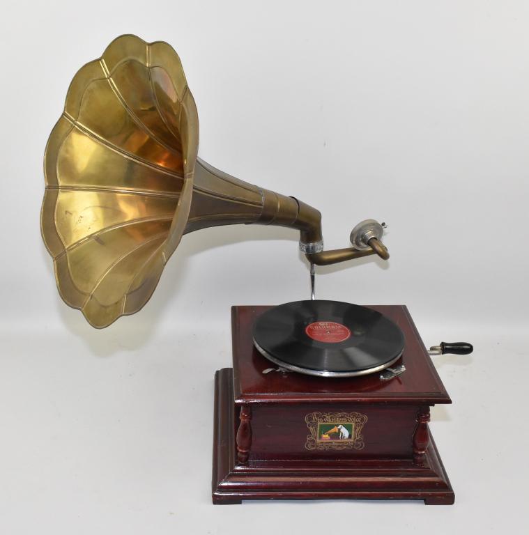 GRAMOPHONE TABLETOP RECORD PLAYER – From the: GRAMOPHONE TABLETOP RECORD PLAYER – From the Gramophone Co., Ltd. Pressed brass morning glory type horn. It is in working condition.