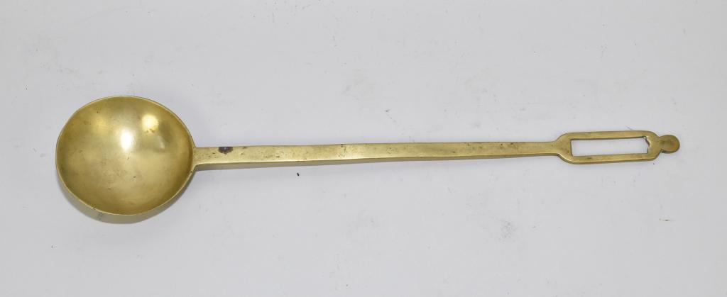 BRASS HEARTH SPOON – 16.75” long. Square cutout: BRASS HEARTH SPOON – 16.75” long. Square cutout in handle.