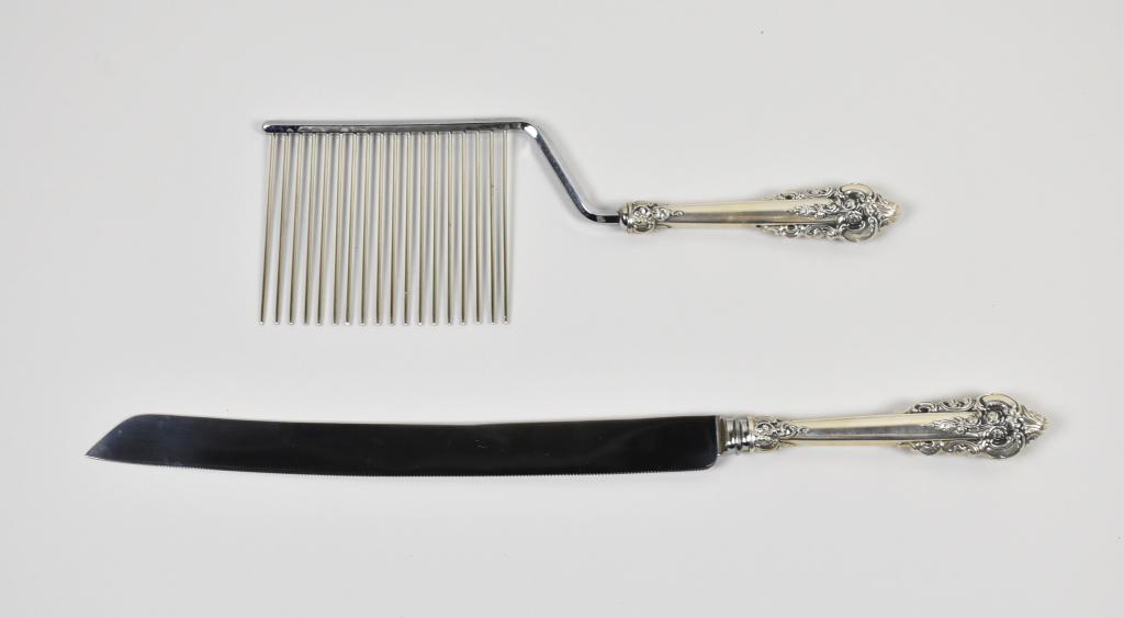 VINTAGE WALLACE STERLING GRAND BAROQUE ANGEL FOOD: VINTAGE WALLACE STERLING GRAND BAROQUE ANGEL FOOD CAKE CUTTER AND LARGE WEDDING CAKE KNIFE. Both marked sterling on handles.Additional pieces. Angel food cutter: 11.5" long x 4" wide. Cake cutter:16.5
