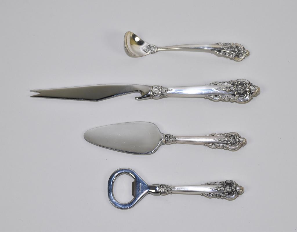 (4) VINTAGE WALLACE GRAND BAROQUE STERLING SIDE: (4) VINTAGE WALLACE GRAND BAROQUE STERLING SIDE PIECES. To include: fish knife – 9 "long, mustard ladle – 5 "long, bottle opener – 5.25 "long, pate knife – 6.5 "long.