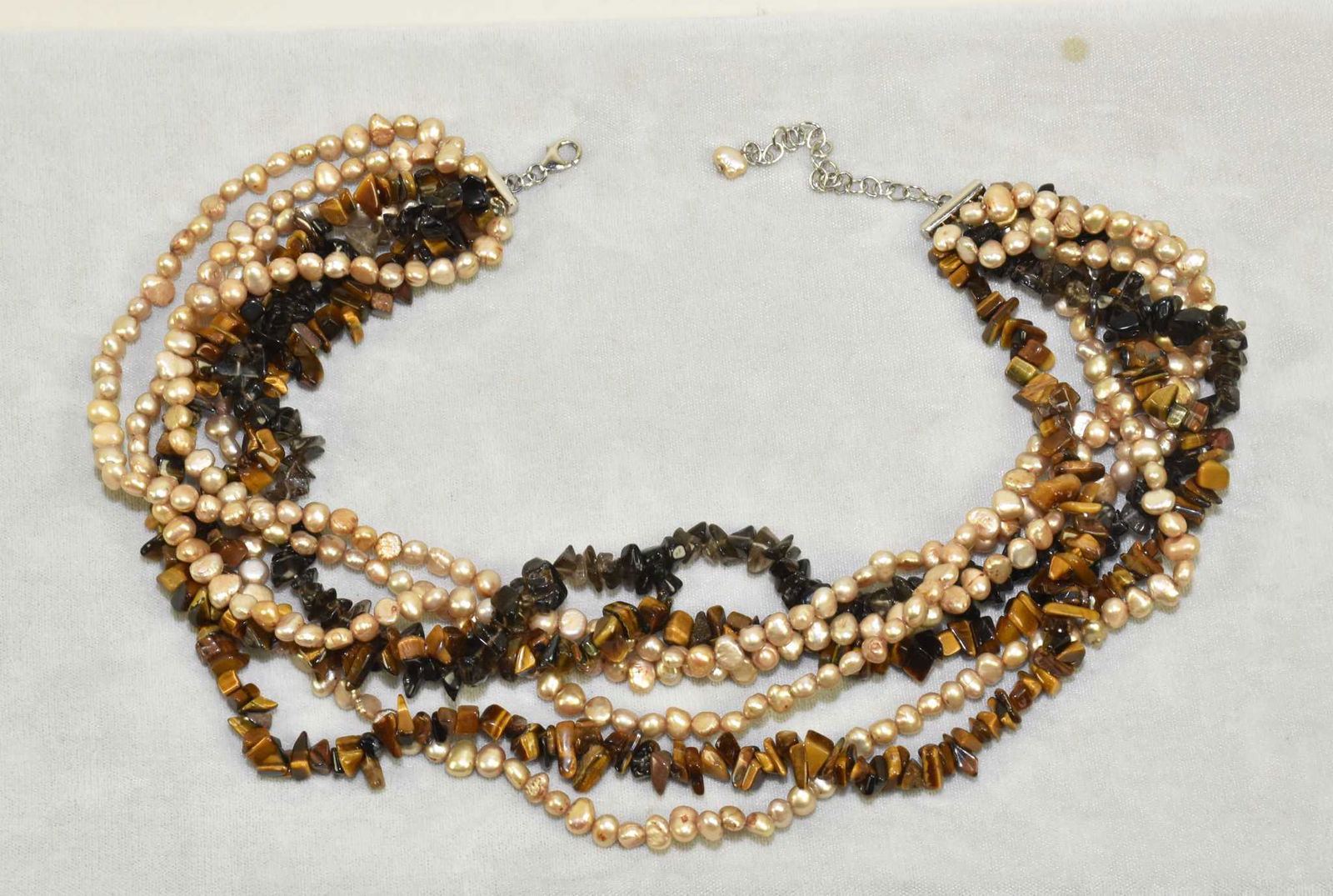 SEVEN MULTI-STRANDED FRESHWATER PEARL AND TIGER (1 of 5)