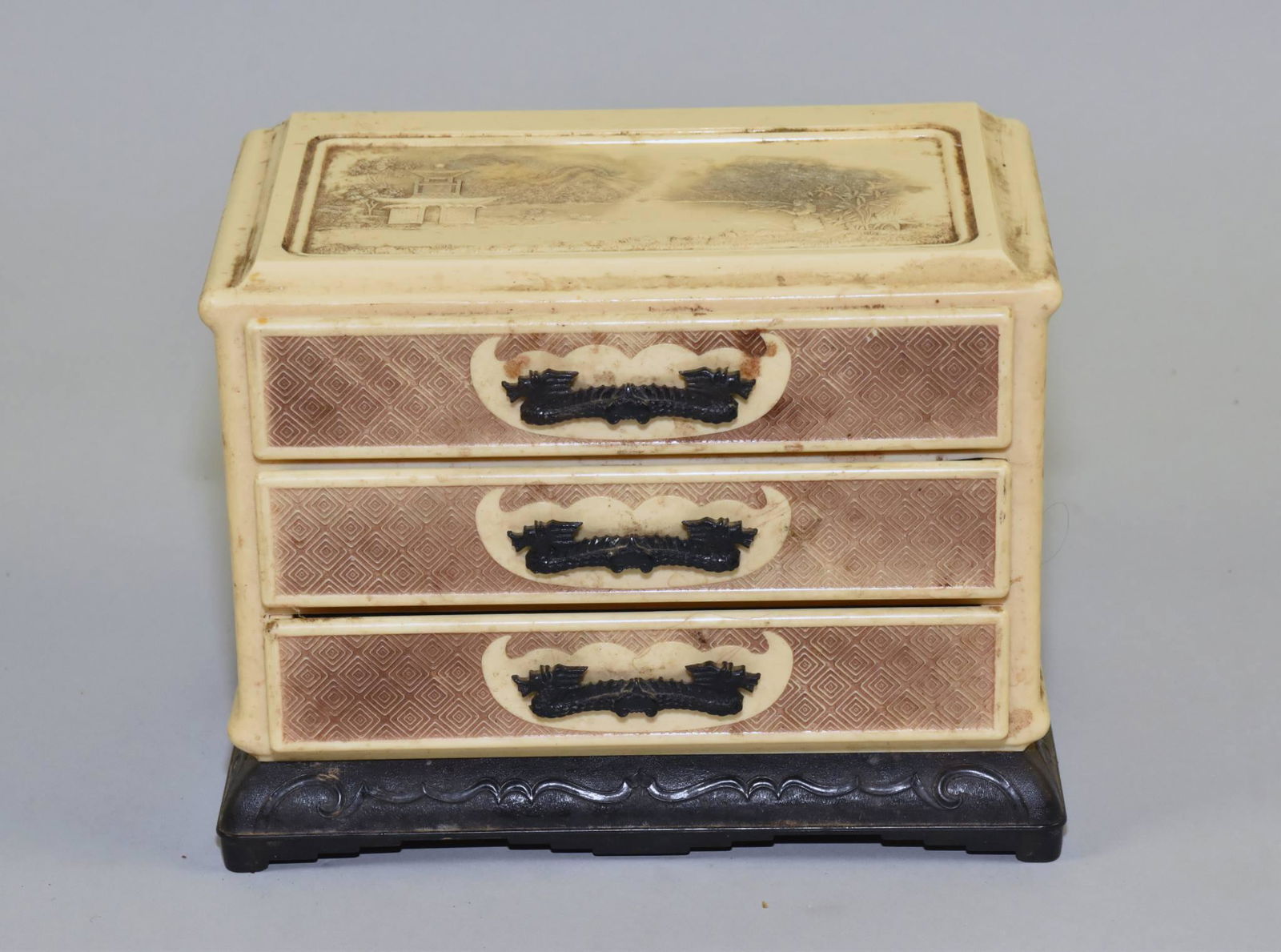 BAKELITE (?) ORIENTAL CHEST WITH ASSORTED COSTUME (1 of 8)