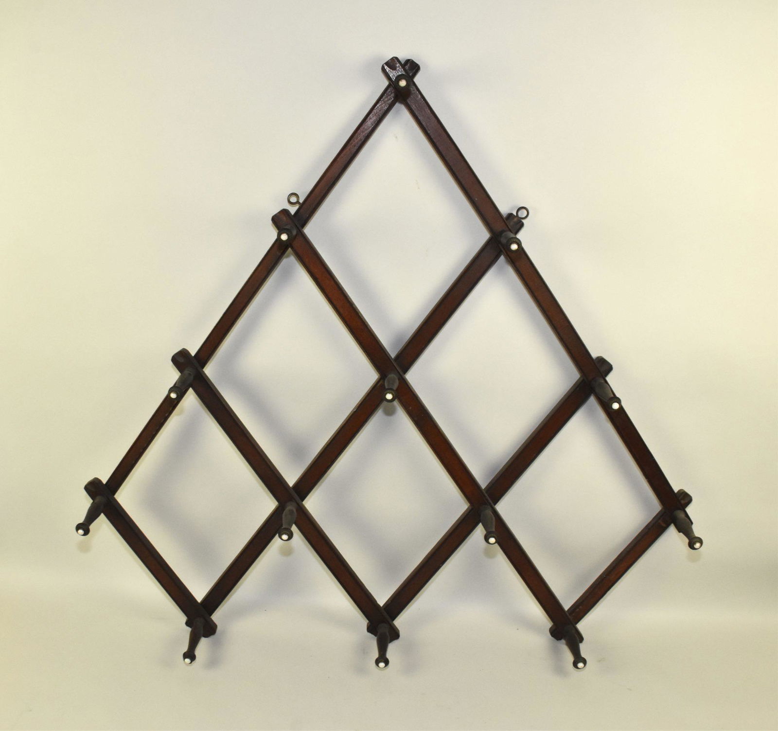 ANTIQUE VICTORIAN ACCORDIAN WALNUT WALL HAT RACK: (1 of 2)