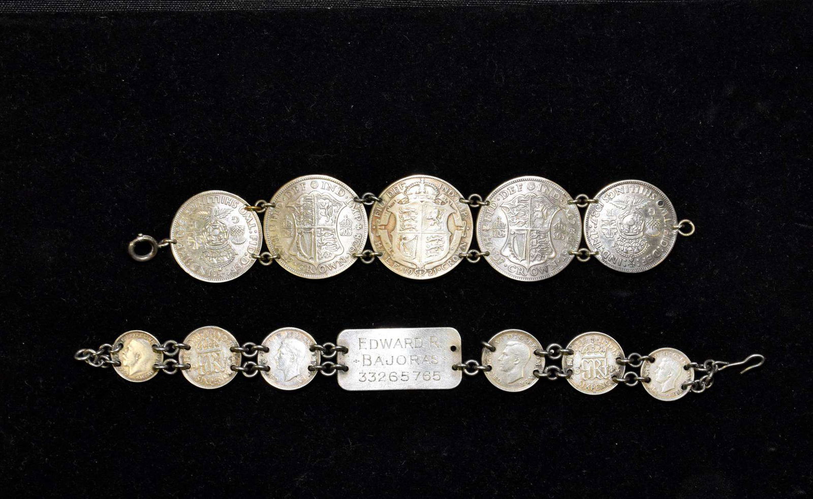 TWO ASSORTED VINTAGE KING GEORGE BRITISH COIN .: TWO ASSORTED VINTAGE KING GEORGE BRITISH COIN CHAIN LINK BRACELETS: Coins to include; three silver have crowns with two shillings,Military; engraved tag & three and six pence.
