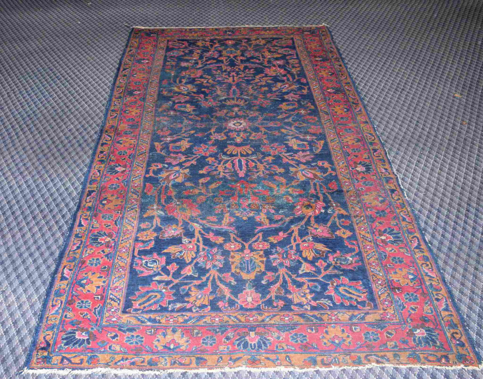 ANTIQUE PERSIAN RUG. Some wear. 5'3" x 9'9".: ANTIQUE PERSIAN RUG. Some wear. 5'3" x 9'9".