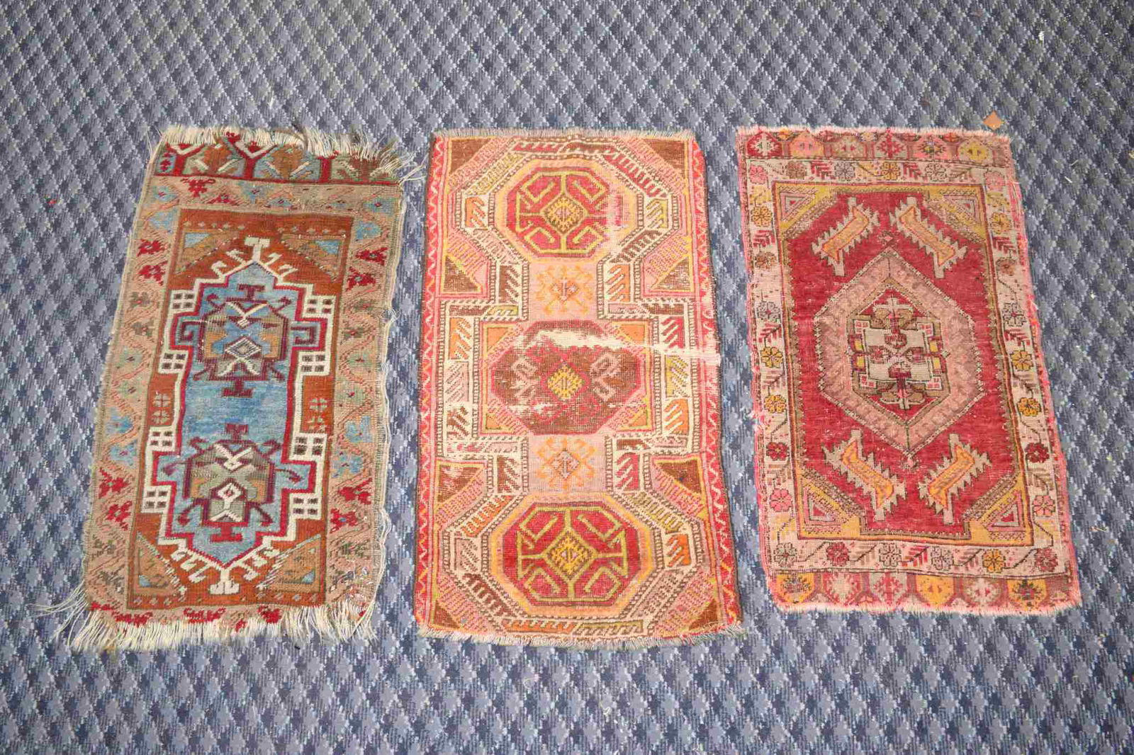 (3) ANTIQUE TURKISH RUGS. APPROXIMATELY 2' X 3'. (1 of 5)