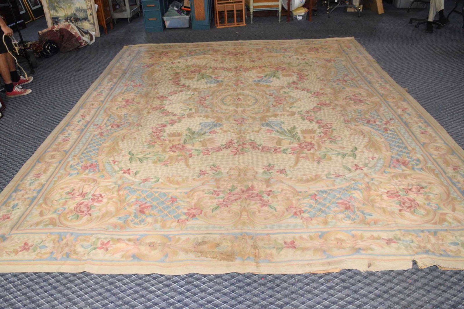 HAND STITCHED RUG. Overall good condition. (1 of 10)