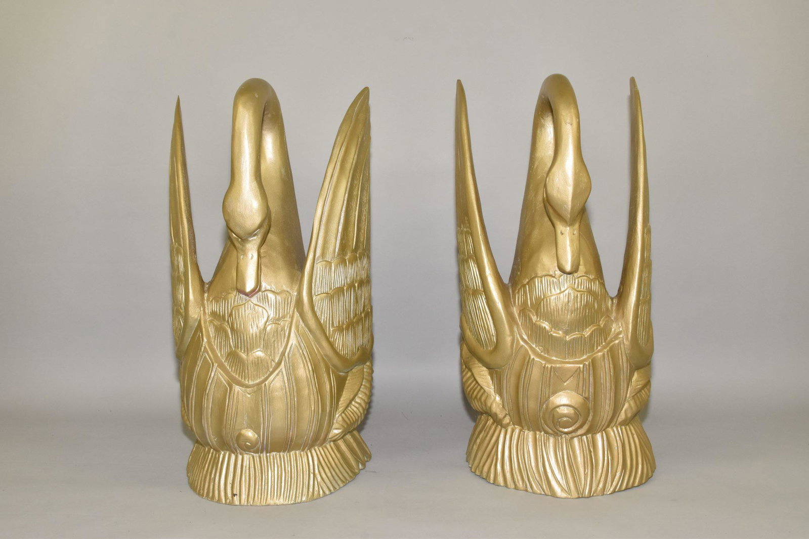 CARVED GILT WOOD FIGURES OF "ROYAL" SWANS- Pair.: CARVED GILT WOOD FIGURES OF "ROYAL" SWANS- Pair. On reeded base. 25" h. Gold painted.