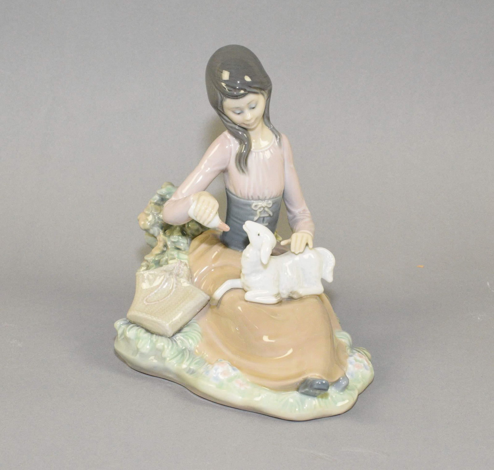 VINTAGE LLADRO FIGURINE #1312: LITTLE BO PEEP: VINTAGE LLADRO FIGURINE #1312: LITTLE BO PEEP BOTTLE FEEDING LAMB: CIRCA 1970'S. EXCELLENT CONDITION. 7" LONG 6 3/4" HIGH 51/4" WIDE .