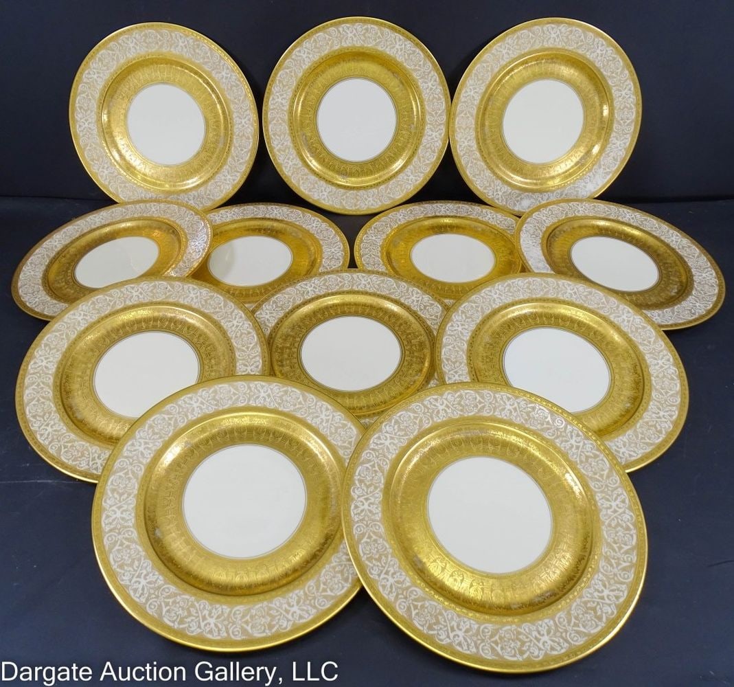 12 HEINRICH & CO GERMAN GOLD ENCRUSTED PLATES: 12 Heinrich & Co German Gold Encrusted Dinner Plates - Circa 1930's; Regency style, made in Selb, Bavaria; Marked on bottom / Measures: 11" diameter / Condition: Slight gold loss from wear and age