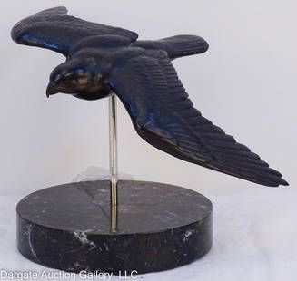 ROBERT BATEMAN PEREGRINE IN FLIGHT BRONZE STATUE: Robert Bateman (Canadian, b. 1930) Peregrine Falcon in Flight bronze statue, on marble base. Falcon sits on a stand, allowing it to move, as if it were in flight. Signed & numbered in the bronze, on t