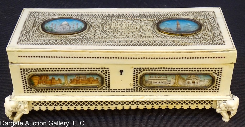 ANTIQUE INDIAN CARVED HAND PAINTED BONE BOX: Antique Indian Carved Hand Painted Bone Box - Carved, reticulated bone box, with hand painted architectural scenes on each side, with elephant feet; has a lock, (Not locked, no key) / Measures: 3.25"H