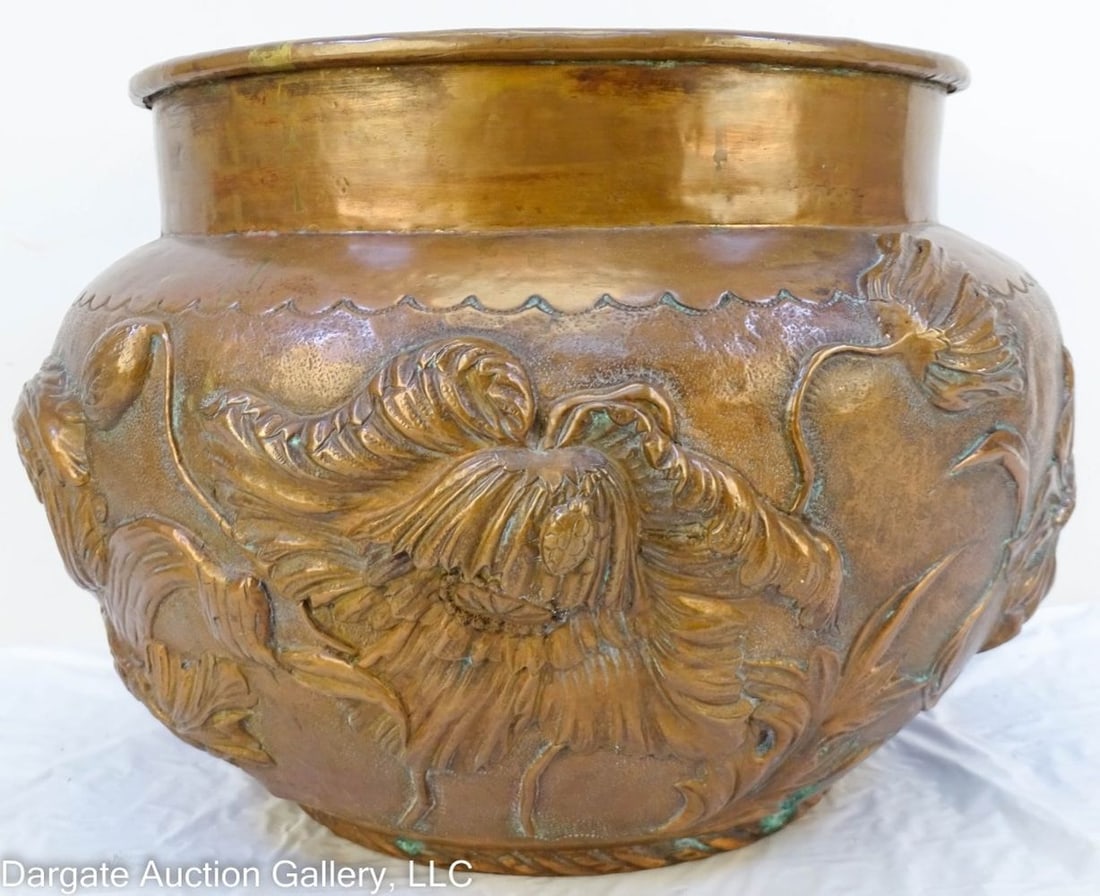 VICTORIAN HAND CHASED COPPER JARDINIERE: Huge Victorian Hand Chased Copper Jardiniere - Hand chased copper with relief decorated flowers and butterflies / Measures: 12"H/13"rim/17"widest / Condition: Wear appropriate with age and use