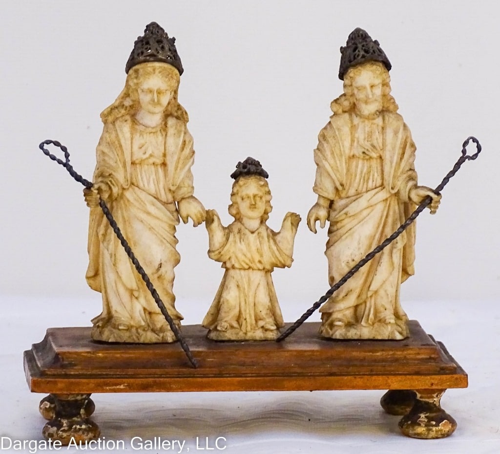 ANTIQUE 18TH C DIEPPE CARVED BONE HOLY FAMILY: Antique 18th Century Dieppe carved bone holy family grouping- Mary, Joseph and child carved bone with silver head coverings on a wood base. From Dieppe Region in France, not signed. / Measures: 4"H x 
