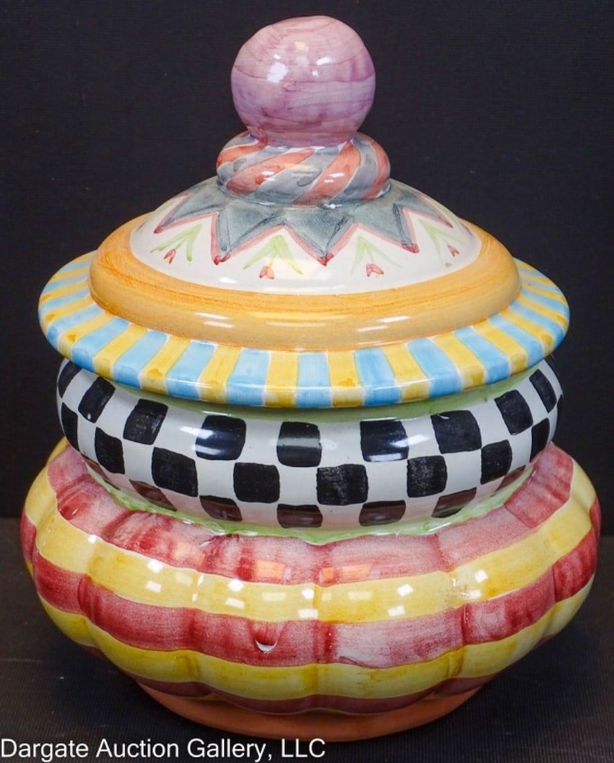 MACKENZIE CHILDS TAYLOR SMALL CANISTER ODD FELLOWS: Mackenzie-Childs Taylor Odd Fellows Small Caniseter - Multi-color and designs covered canister/ Measures: 9"H / Condition: Chip on rim of lid