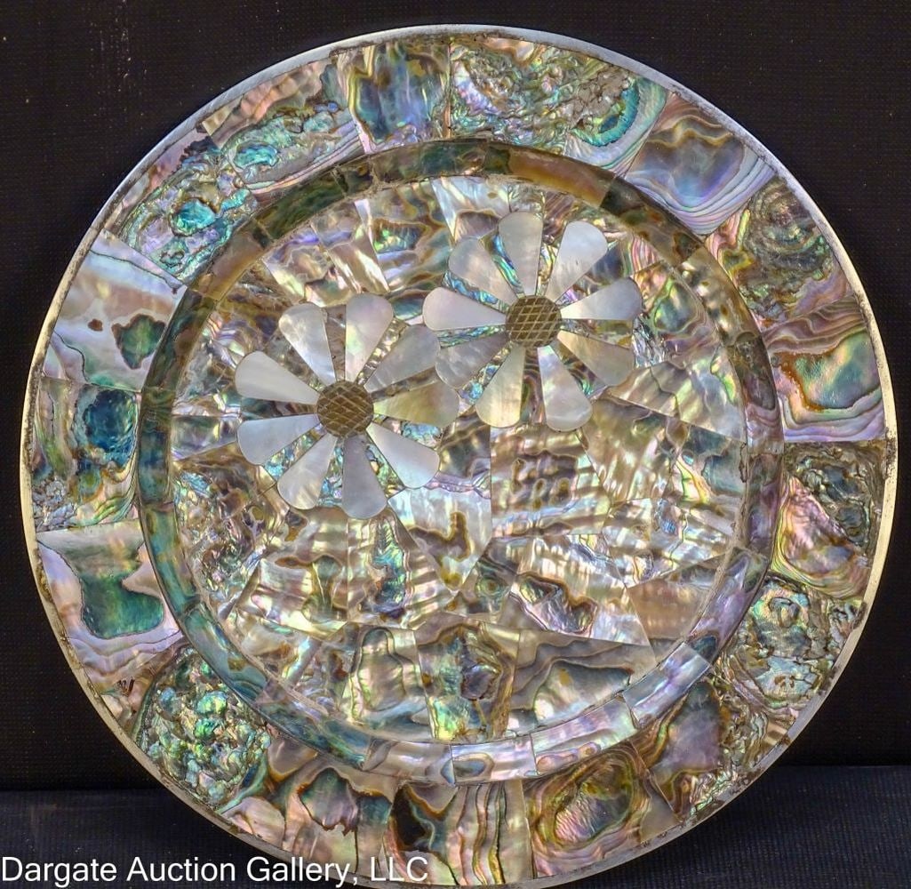 TAXCO 1965 LOS CASTILLO ABALONE INLAID PLATE: Taxco 1965 Los Castillo Abalone Inlaid Plate - Handmade in Mexico; Inlaid abalone with mother of pearl flowers, marked on bottom / Measures: 7" diameter