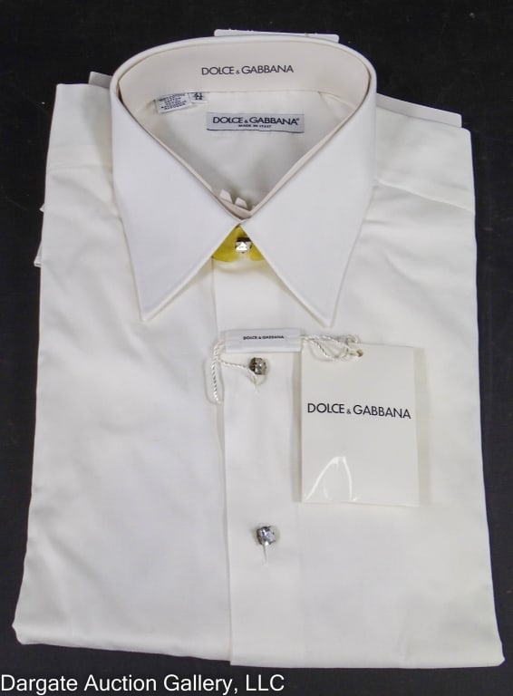DOLCE & GABBANO MEN'S WHITE RHINESTONE SHIRT: White Rhinestone button up shirt / clear rhinestone buttons and cufflinks / 100% cotton / Measurements: Size 16.5/42 / Condition: New, never wornDISCLAIMER: ****WHILE THE DESIGNER ITEMS IN OUR SALE AR