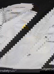 DOLCE & GABBANO MEN'S WHITE RHINESTONE SHIRT: White Rhinestone button up shirt / clear rhinestone buttons and cufflinks / 100% cotton / Measurements: Size 16.5/42 / Condition: New, never wornDISCLAIMER: ****WHILE THE DESIGNER ITEMS IN OUR SALE