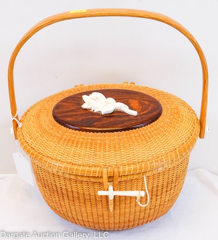 NANTUCKET BASKET PURSE BY BILL/JUDY SAYLE: Woven Nantucket basket form purse made by Bill & Judy Sayle in 2001 / Lid has carved Rose design, interior has scrimshaw-like monogram SPO / Marked: Made in Nantucket Bill & Judy Sayle 2001 / Measurem