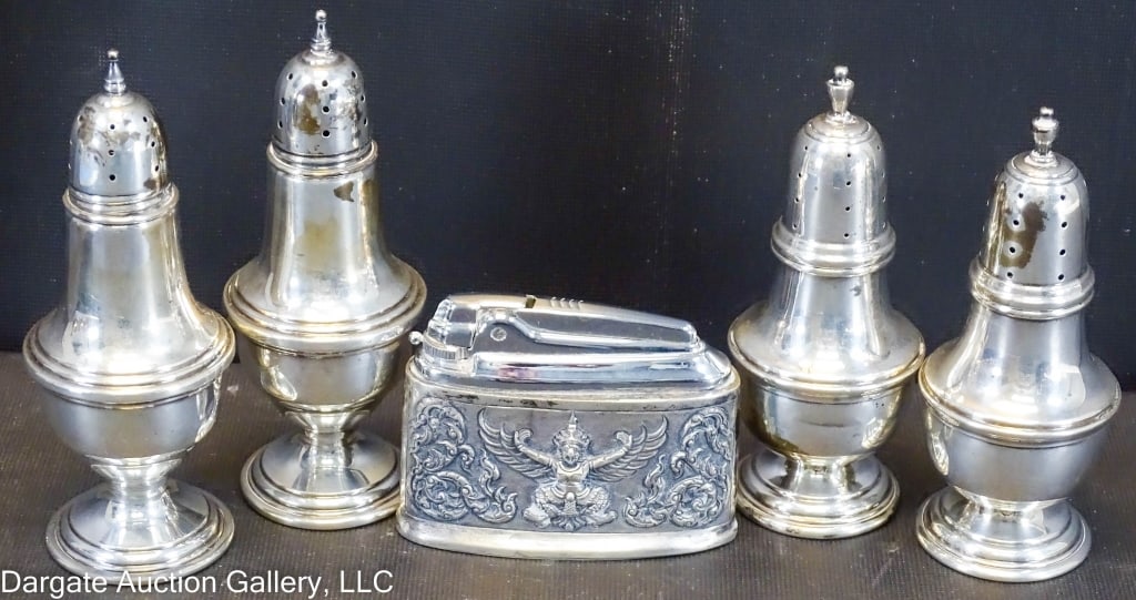5pc STERLING SILVER SALT & PEPPER & TABLE LIGHTER: Includes: - Pair of N Sterling Ellmore 825 4.25"H - Pair Sterling 49 4.75"H - 1 table lighter 2.25"H / Weight: 9.42 ozt / Measurements: 2.25"H - 4.75"HPAYMENT DISCLAIMER ****SEE TERMS AND CONDITIONS F