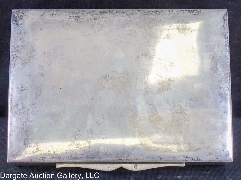 HUNGARIAN STERLING AND WOOD JEWELRY BOX: A Sterling and wood jewelry box with Hungarian Hallmarks for 835 Sterling / Marked 835 EV S on bottom, marks for Hungary on lid / Measurements: 1.75"H x 8"W x 5.75"W / Condition: A few minor scuffs co