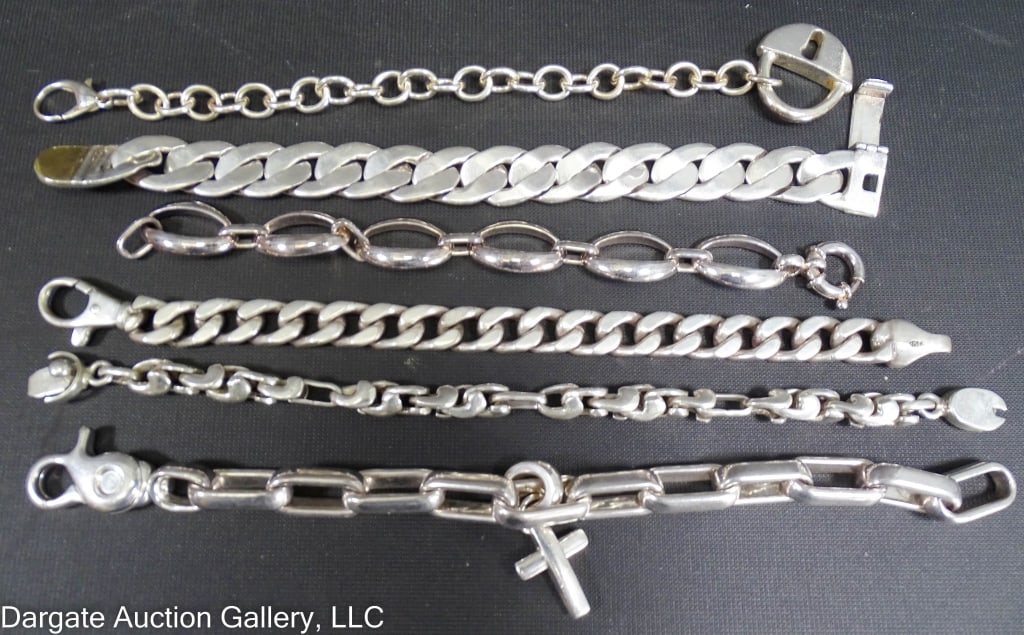 6 STERLING SILVER CHAIN LINK BRACELETS: Includes: (1) Sterling heavy link bracelet (9?L) / (1) Sterling chain link bracelet (9?L) / (1) Link chain with cross pendant (9.5?L) / (1) Robert Lee Morris Sterling chain link with lock (9?L) / (1)