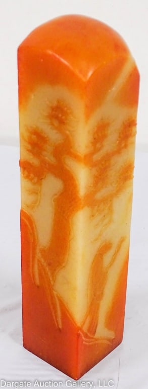 CHINESE SHOUSHAN STONE SEAL CHOP BLANK: Orange and yellow Shoushan stone with carved scene on all four sides with a sage walking down a hill in a mountain landscape / Measures: 6.5"H x 1.25"square / 18.12oz