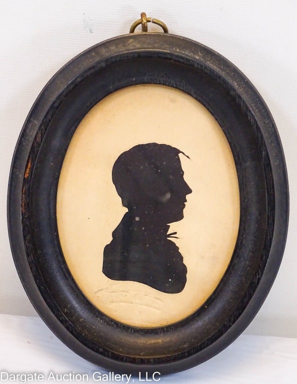 PEALES MUSEUM SILHOUTTE ATTRB TO RAPHAELLE PEALE: Attributed to Raphaelle Peale (American/PA/MD, 1774-1825) / Silhoutte of a man, right facing, embossed Peale Museum stamp below / Set under glass in black oval frame / Visible Art Size: 4"H x 3"W / Fr