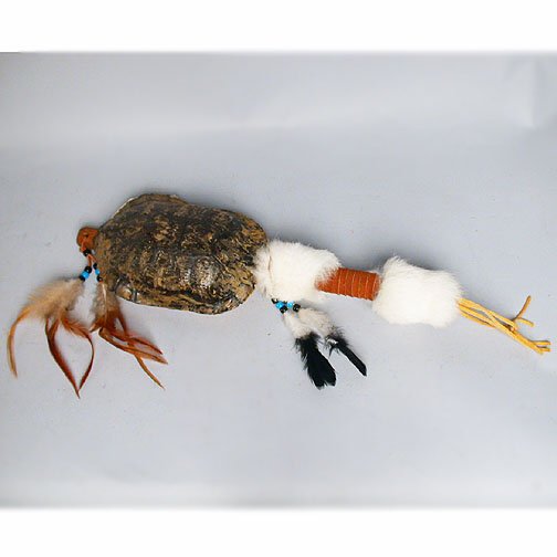 NATIVE AMERICAN TURTLE RATTLE. N/R. Nati: NATIVE AMERICAN TURTLE RATTLE. N/R. Native American turtle rattle, created from dead turtle shell, fur, feathers, beads, leather wrapped shaft. No mark. Size: 17''L. Condition: good.