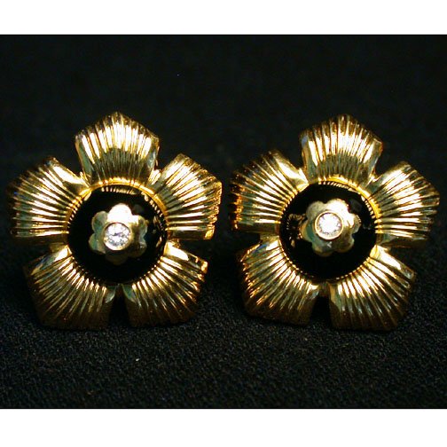 18K ONYX FLOWER EARRINGS. The earrings