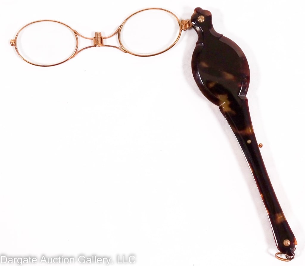 ANTIQUE CELLULOID LORGNETTE: Gold tone with a faux celluloid tortoise shell handle / Measures: closed - 6"L x 1.25"W, glasses - 4" wide/ ONLINE PAY MSG ****SEE TERMS AND CONDITIONS FOR SPECIAL PAYMENT REQUIREMENTS****