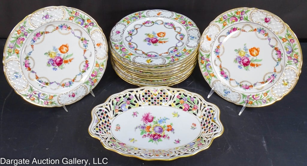 12pcs SCHUMANN BAVARIAN CHINA: Twelve pieces of Schumann Bavarian China: (1) pierced openwork oval bowl, 12" X 8.5"; and (11) dinner plates, 10" in diameter. Marked [Schumann Bavaria Germany US Zone]. / Provenance: From the descend