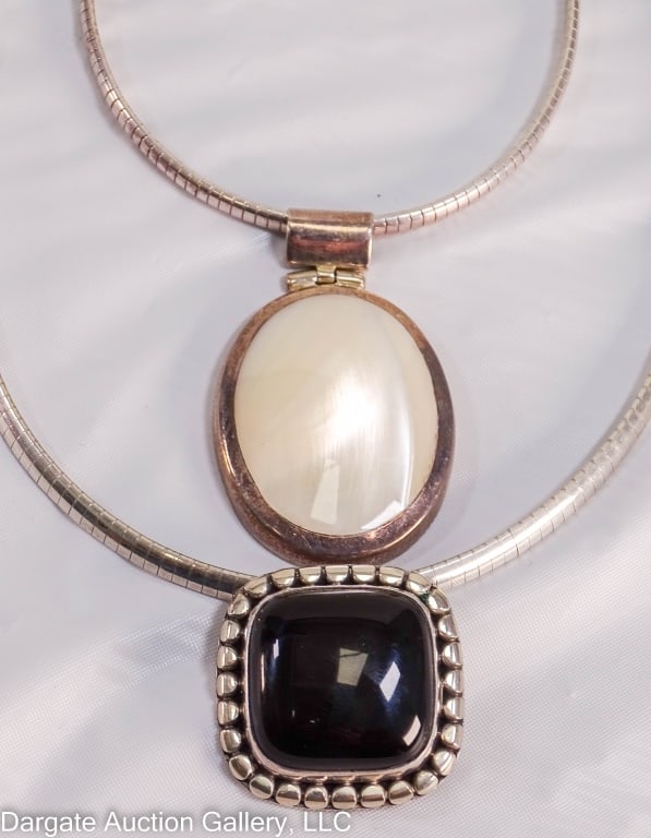 2 STERLING OMEGA NECKLACES WITH PENDANTS: Includes: Mexican Sterling Omega necklace, with a large oval mother of pearl pendant. Necklace marked 925 ITALY; 925 MILOR ITALY. Pendant is marked ATI 925 MEXICO; Necklace 18?L, 23.49g, Pendant 1.75?