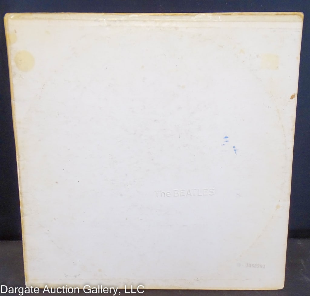 1968 THE BEATLES WHITE ALBUM 1ST PRESS APPLE LABE: The Beatles White Album 1st Press Apple label Seriel # 1368794 impressed on front / gatefold cover / not graded / Condition: Water damage and wear to cover