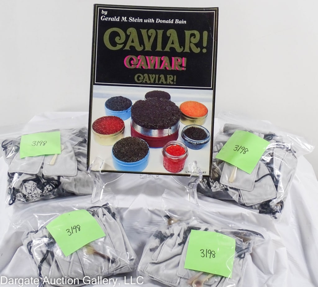 107pc ASST CAVIAR SERVICE ITEMS: Includes: (1) Book - Caviar! Caviar! Caviar! By Gerald M Stein with Donald Bain / (100) 2.25" Horn Caviar Spoons by Arca / (3) 2pc sets Horn Caviar serving spoon & spreader by Arca