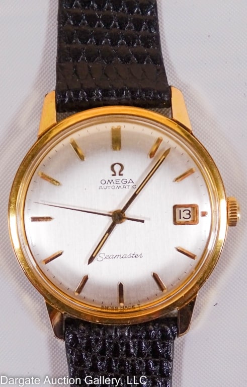 OMEGA SEAMASTER AUTOMATIC REF No 166.002 WATCH: Circa 1962 / 34mm / Stainless Steel base with gold plate case / 30m water resistant / Automatic movement (runs) calibre #562, serial No 23847439 / 24 jewels / white dial, second hand sweep, black leat