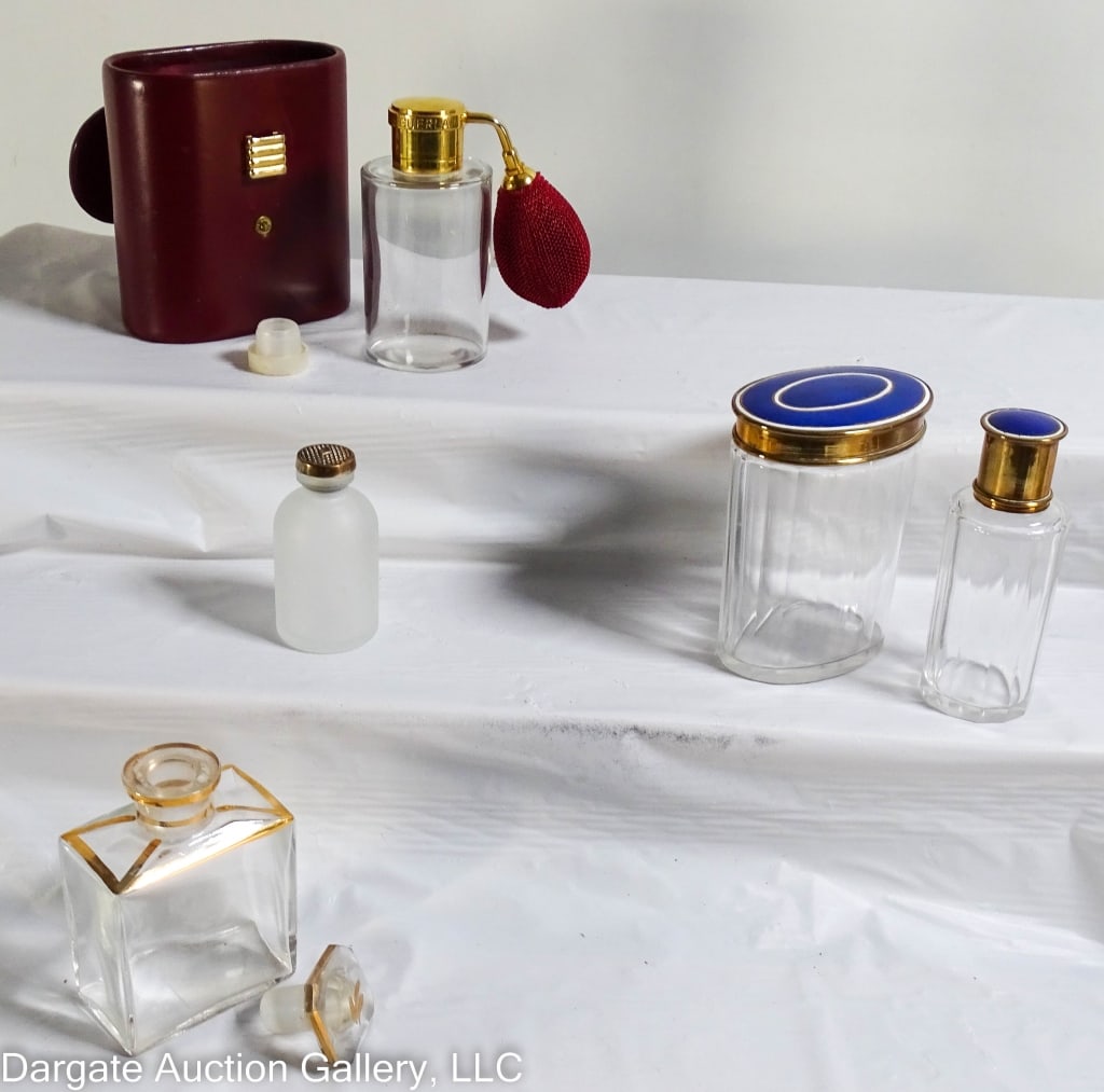 5pc VINTAGE DRESSER BOTTLES: (1) Oval glass jar with enamel lid 3.5"H x 2.75"W x 2"D / (1) Round glass bottle with enamel lid 3.75"H / (1) Guerlain perfume bottle including case, and 2 bottles with gilt decoration - bottle 3.75"H