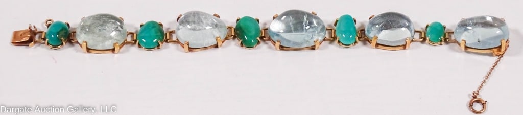 14k YELLOW GOLD & TOPAZ BRACELET: 14k Yellow gold bracelet set with clear topaz (approx. 18mm x 25mm) and opaque green stones (9mm x 16mm), with safety chain. Marked 14k on either side of the clasp / Weight: 61.1g total / Measurements