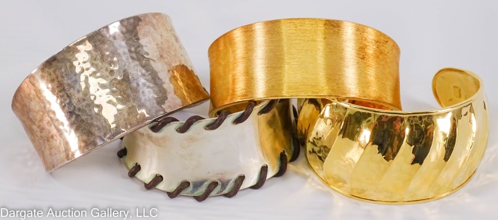 4 STERLING SILVER WIDE CUFF BRACELETS: Includes: Veronese Sterling Vermeil cuff bracelet; marked 925 ITALY V; 2.5?W (across the widest part of the opening), 1.5?W (width of the cuff), 32.31g / Veronese Sterling Vermeil cuff bracelet with a