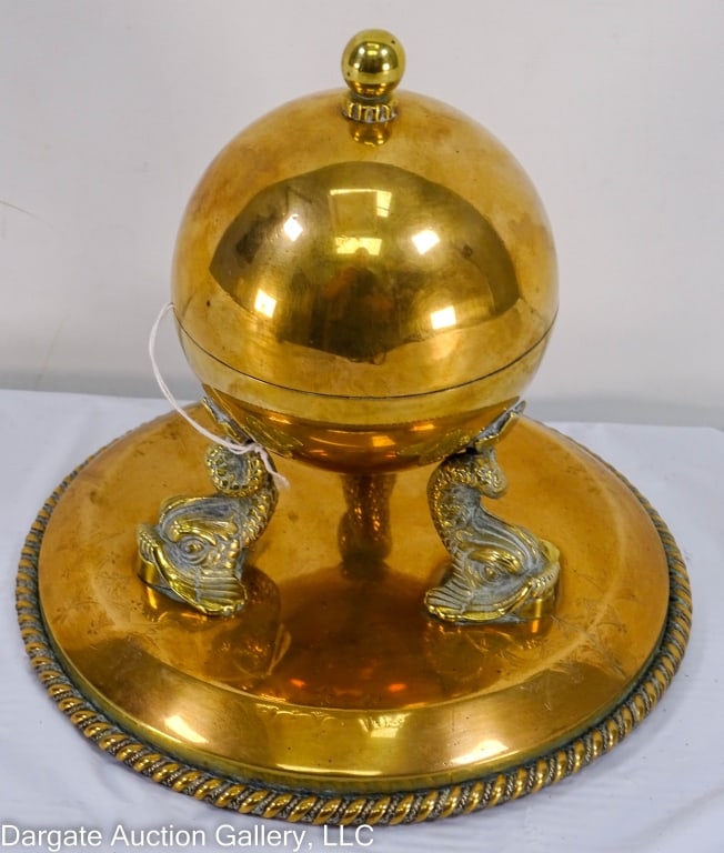 BRASS INK WELL G. BETJEMMANN ENGLAND DOLPHIN: Antique brass sphere on dolphin feet ink well marked on bottom G. Betjemmann & Son England. Old ink bottle as insert. / Measures: 7"H x 7.25" Diam / Provenance: From the descendants of Lollie Oliver,