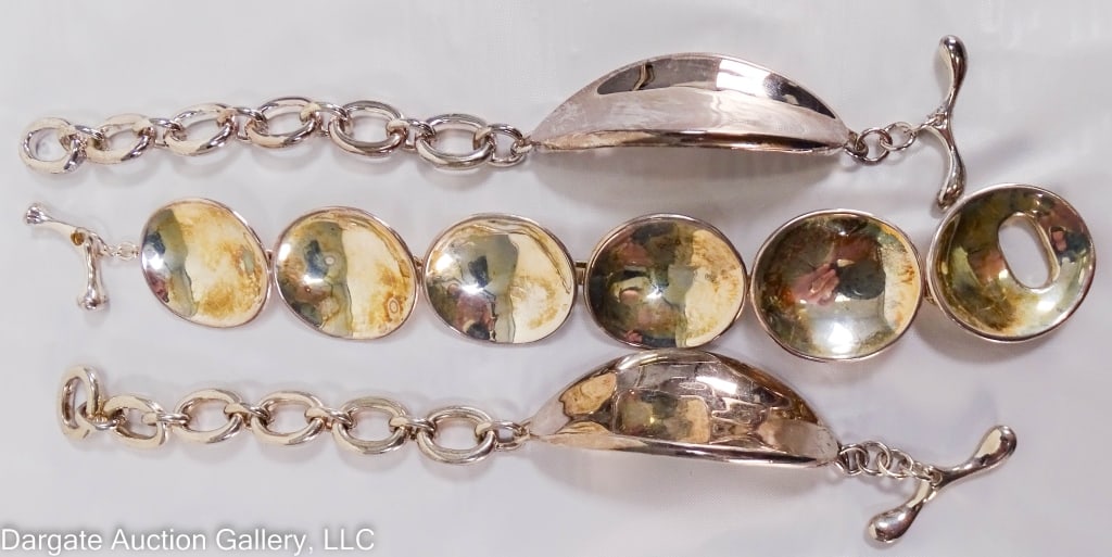 3 RLM STUDIO STERLING SILVER BRACELETS: Includes: Round link bracelet with toggle clasp; 8.5?L, 55.86g / (2) ID link chain bracelet with toggle clasp, no engraving; 8?L, 50.00g & 48.59g / All are marked RLM STUDIO 925 / Weight: 154.48g / Pr
