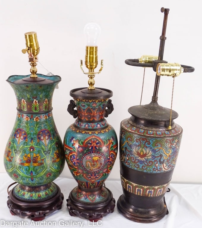 THREE CHINESE CLOISONNE VASE LAMPS: Three Chinese Cloisonne Vases that have been made into lamps. No harps or shades are included. One lamp has a broken socket. Two of the lamps have a single socket, one lamp has a double socket. / Prov