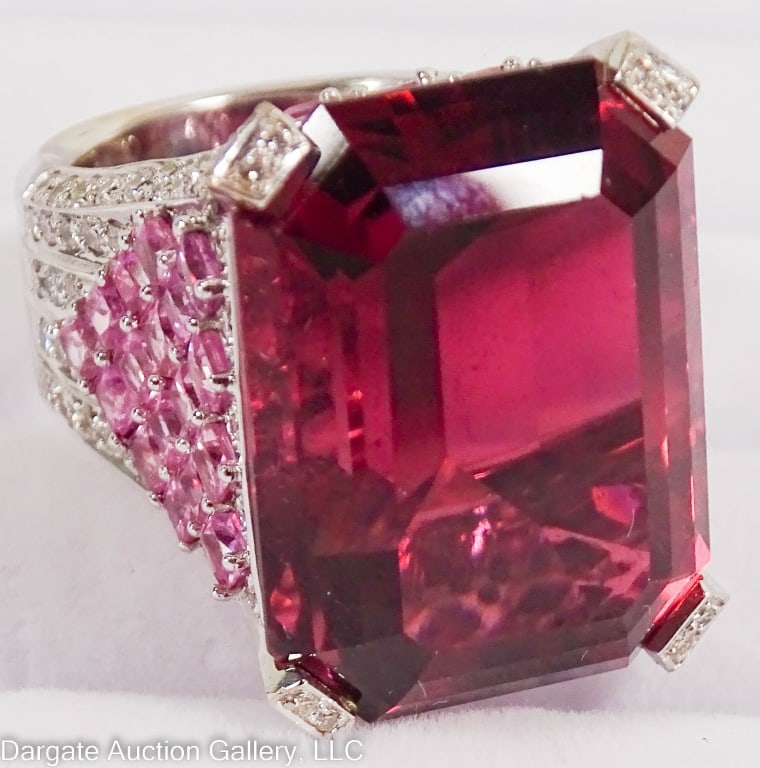 18k TOURMALINE PINK SAPPHIRE & DIAMOND RING: 18k gold Size 5 ring set with Rubellite Tourmaline (23.42mm x 17.14mm approx. +27cts), Pink Sapphire (3mm, approx. 0.15cts) and Diamond (1.25mm) ring / signed and marked "750"on the inside of band / W