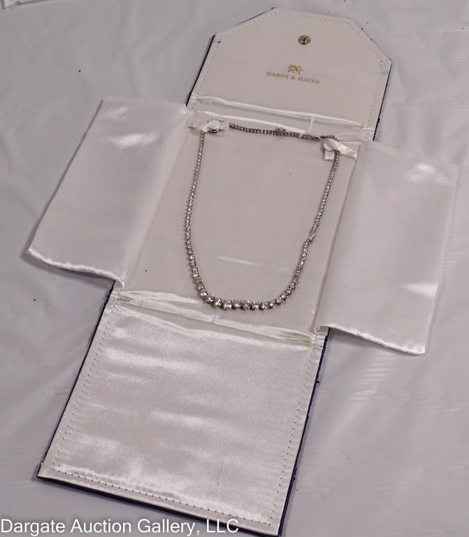 18K GOLD 22 CTTW DIAMOND RIVIERE NECKLACE: 19" long 18k white gold necklace set with diamonds ranging from 2.2mm to 7mm in graduated sizes. Approximate estimate is 22cttw / Necklace was originally 16"long, but Levine Jewelers extended the leng